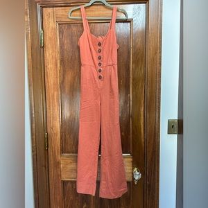Cotton Candy LA jumpsuit. Size small. Color coral. Tie back detailing.